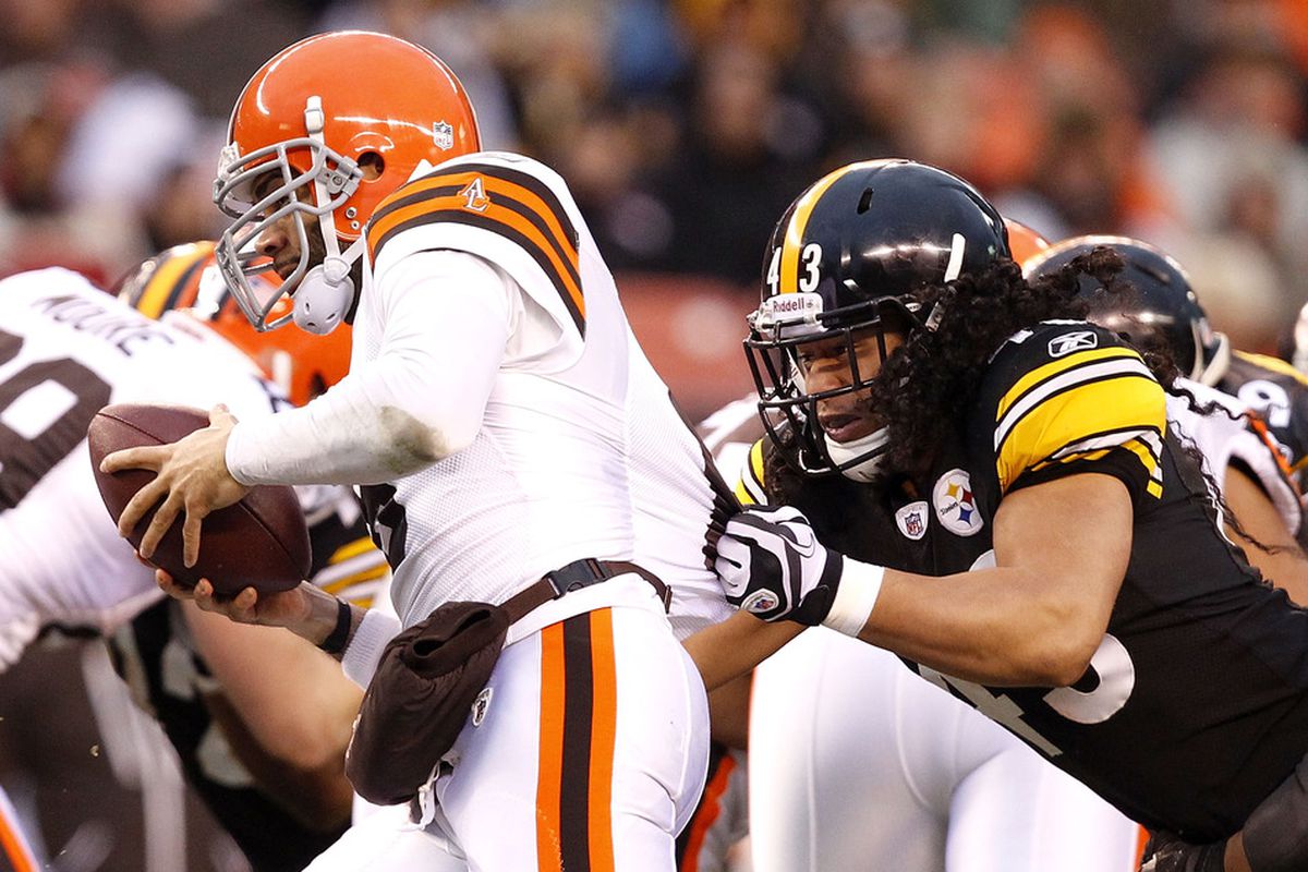 CLEVELAND, OH - JANUARY 01: Safety Troy Polamalu #43 of the Pittsburgh Steelers tackles quarterback Seneca Wallace #6 of the Cleveland Browns at Cleveland Browns Stadium on January 1, 2012 in Cleveland, Ohio. (Photo by Matt Sullivan/Getty Images)