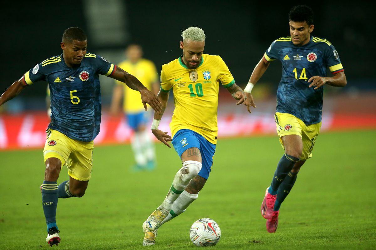 Neymar Jr of Brazil competes for the ball with Wilmar Barrios and Luis Diaz of Colombia during the match between Brazil and Colombia as part of Conmebol Copa America Brazil 2021 at Estadio Olímpico Nilton Santos on June 23, 2021 in Rio de Janeiro, Brazil.