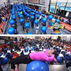 The sea of blue exercise balls in Rockefeller Plaza.