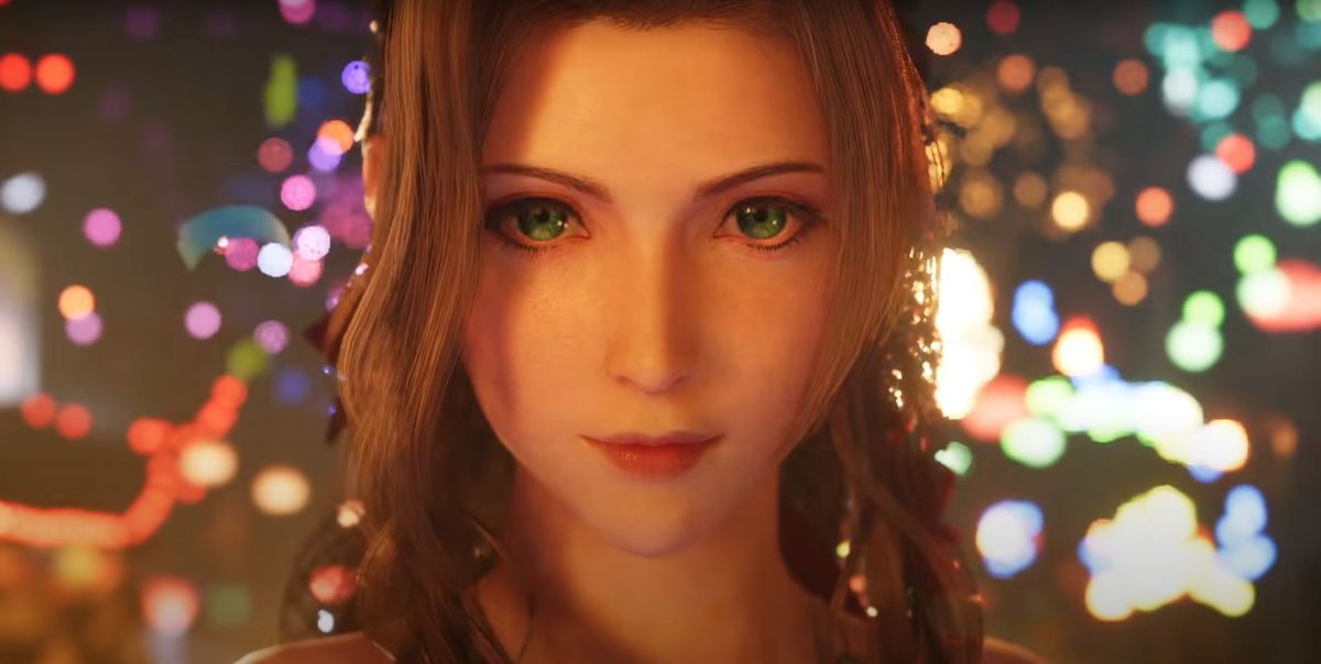Aerith, backlit by the streets of Wall Market, flashes a gentle smile in Final Fantasy 7 Remake