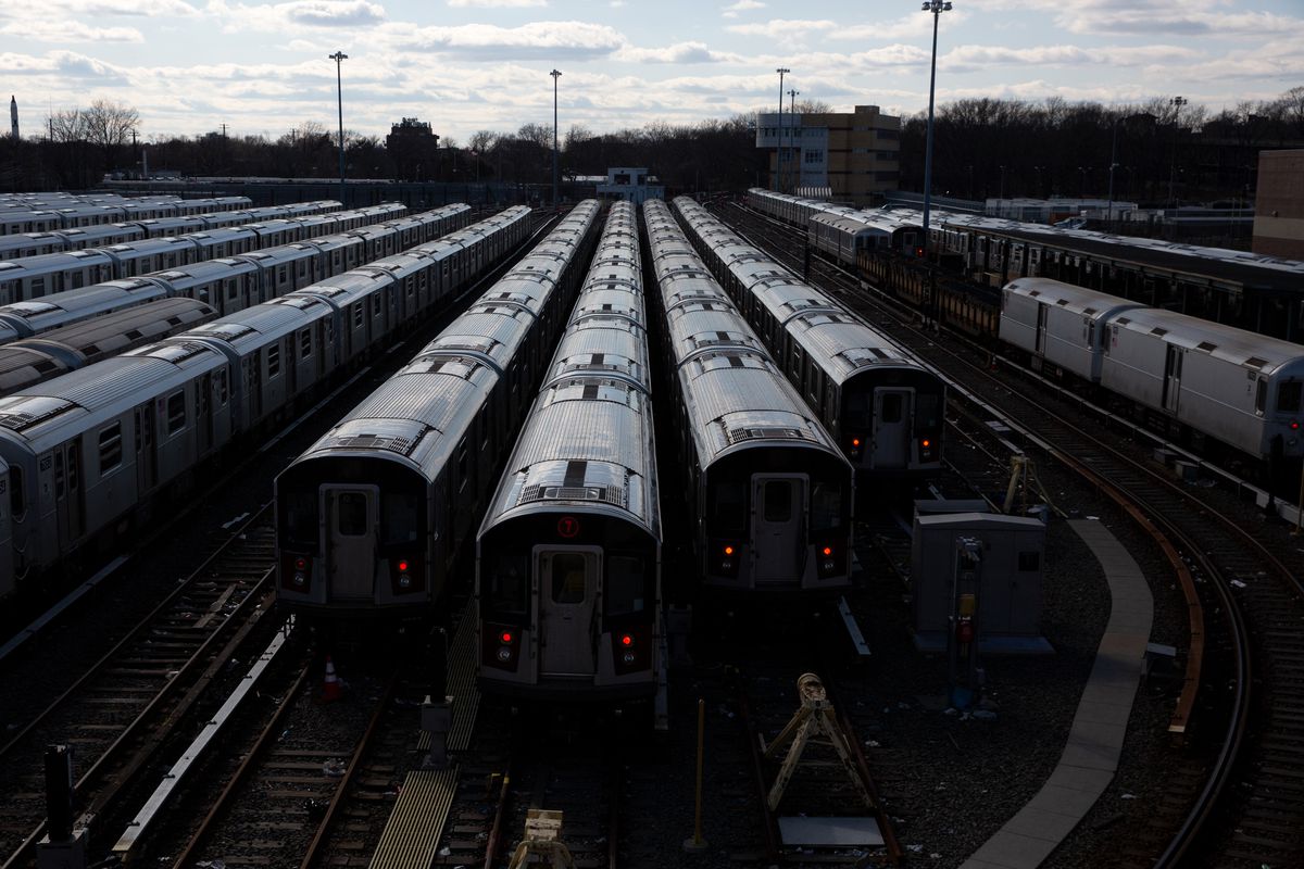 7 trains sit in waiting at a yard in Flushing Meadows Corona Park, March 4, 2021.