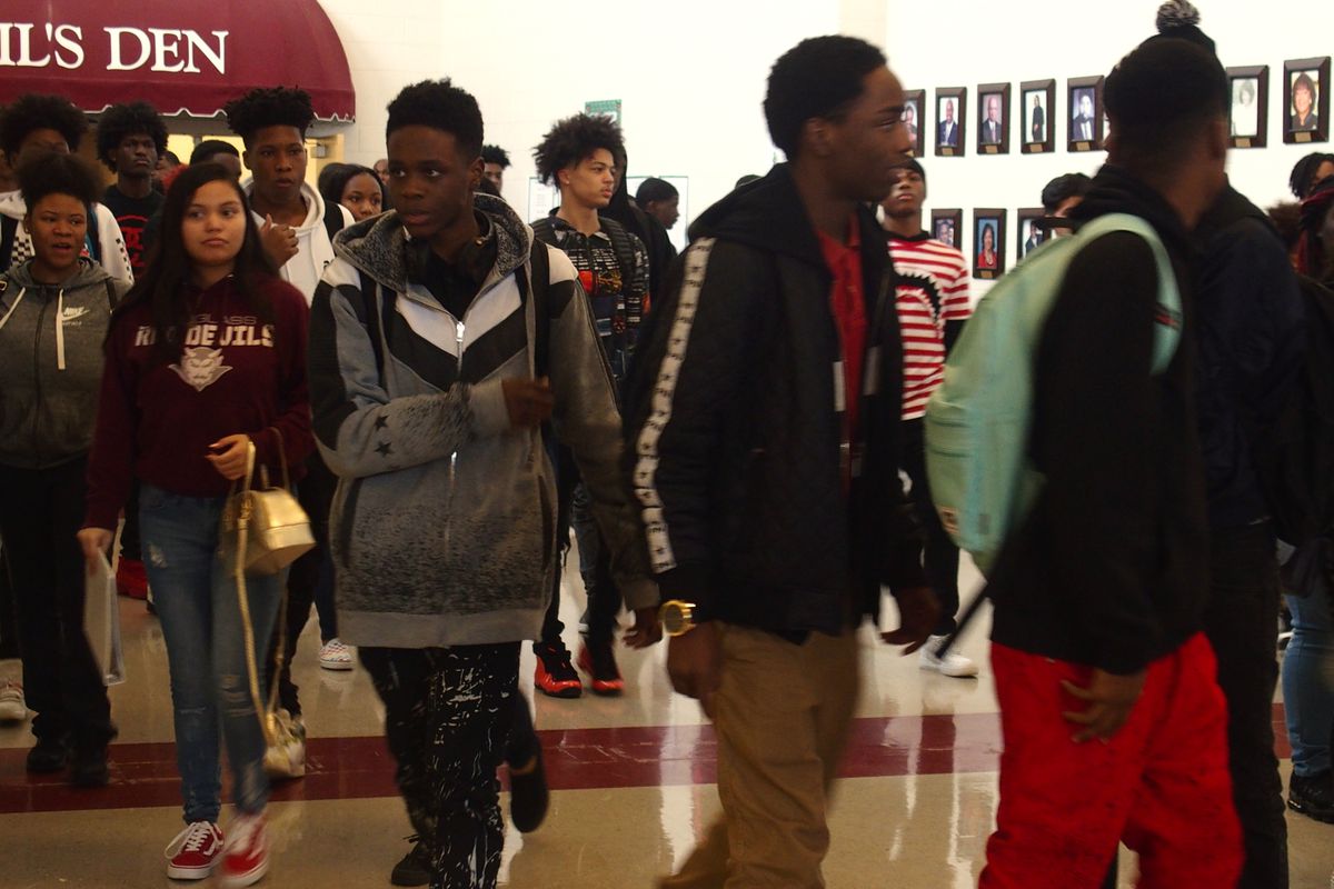 Students walk to class at Douglass High School.