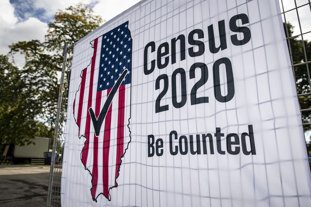 Signs advertising the 2020 Census are posted near South Sacramento Drive and West Roosevelt Road in former Douglas Park on the Southwest Side, Tuesday morning, Sept. 29, 2020.