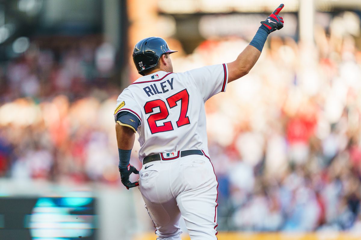 Austin Riley of the Atlanta Braves celebrates after hitting a home run in the first inning during the game against the Minnesota Twins at Truist Park on June 27, 2023 in Atlanta, Georgia.