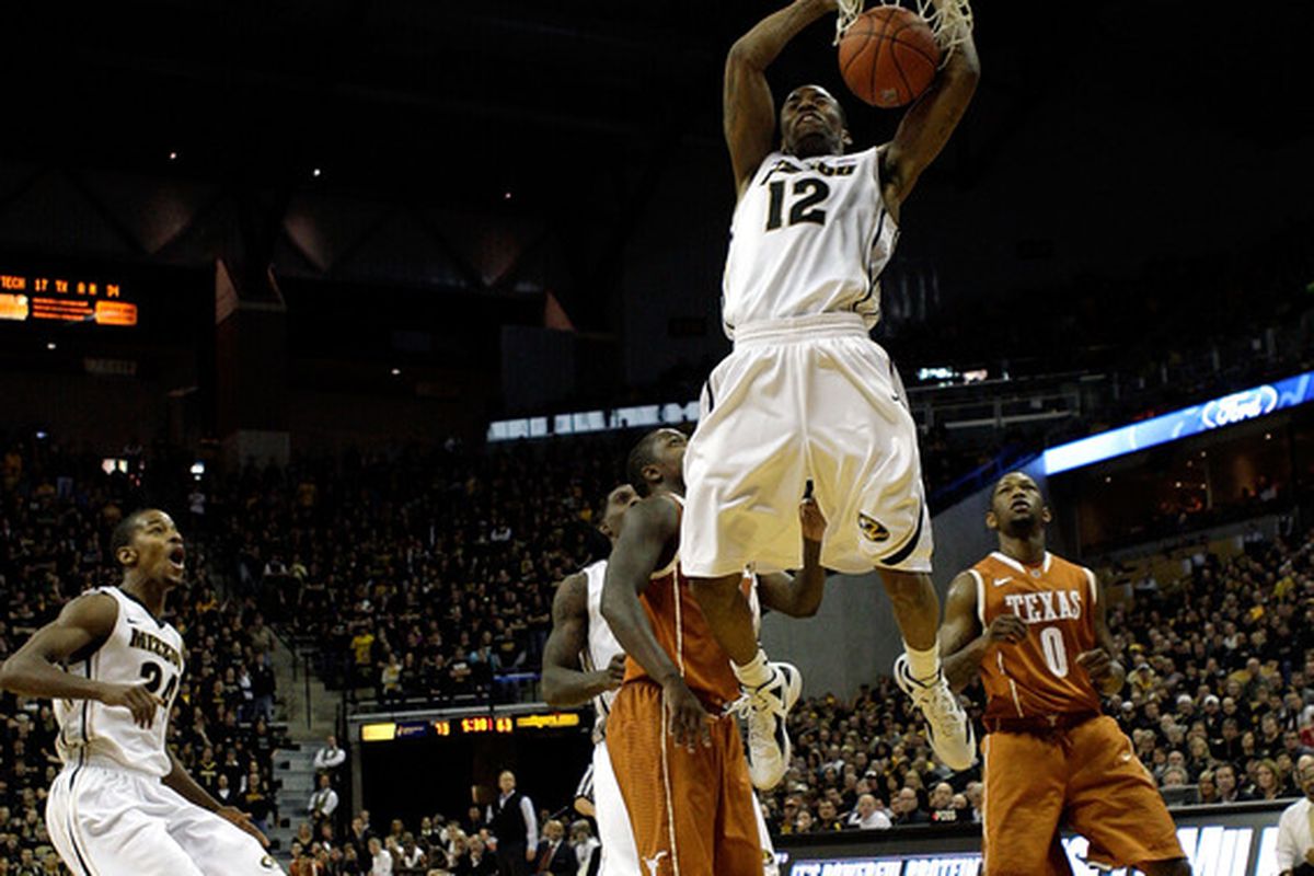 COLUMBIA, MO - JANUARY 14:  Marcus Denmon #12 of the Missouri Tigers dunks during the game against the Texas Longhorns on January 14, 2012 at Mizzou Arena in Columbia, Missouri.  (Photo by Jamie Squire/Getty Images)