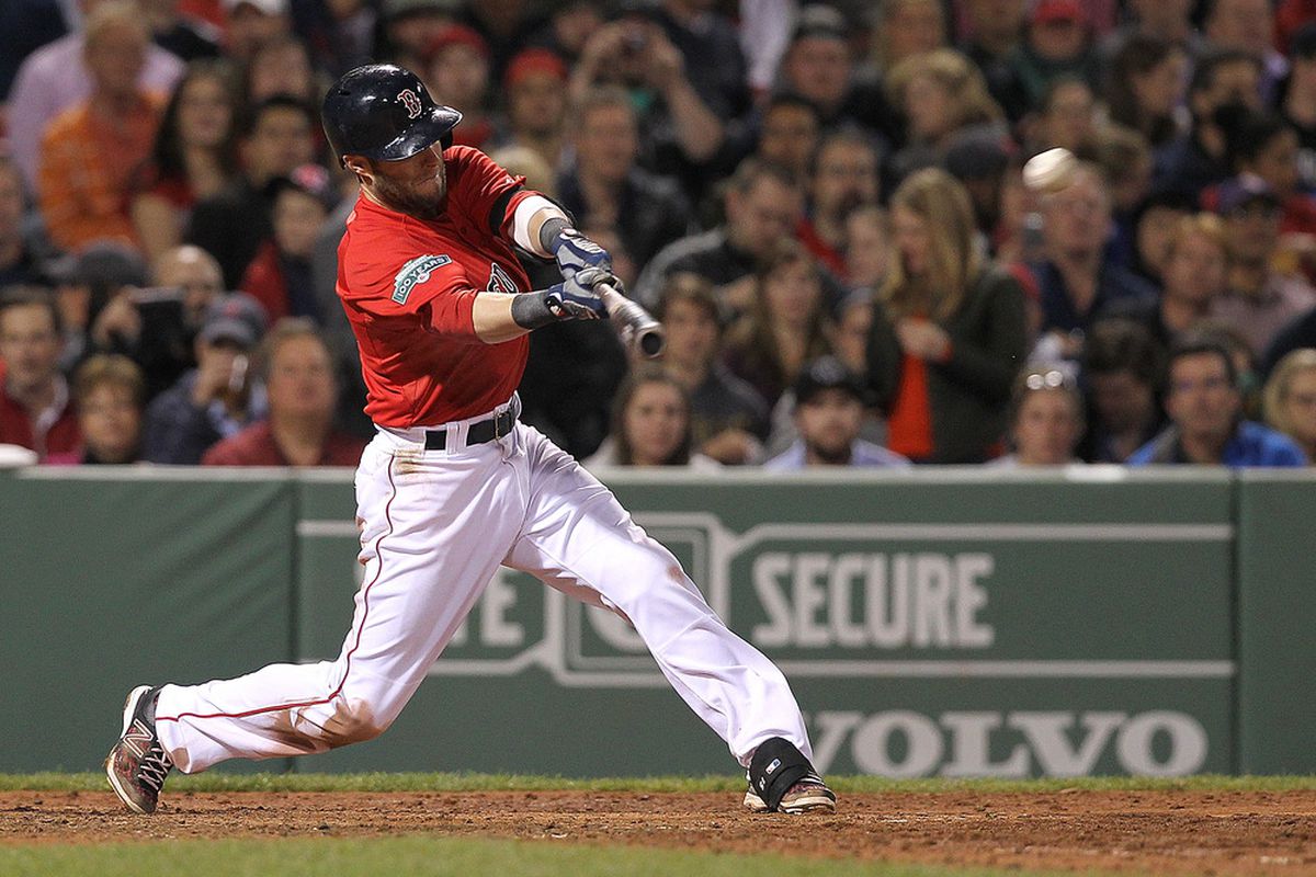 BOSTON, MA - MAY 11:  Dustin Pedroia #15 of the Boston Red Sox knocks in a run with a sacrifice fly against  the Cleveland Indians in the fifth inning at Fenway Park May 11, 2012  in Boston, Massachusetts.  (Photo by Jim Rogash/Getty Images)