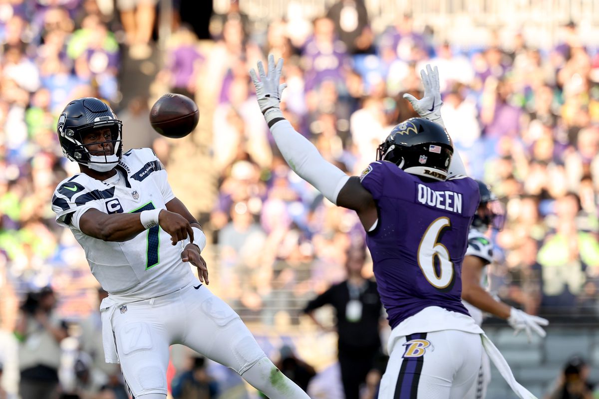Geno Smith #7 of the Seattle Seahawks throws a pass in the game against the Baltimore Ravens at M&amp;T Bank Stadium on November 05, 2023 in Baltimore, Maryland.
