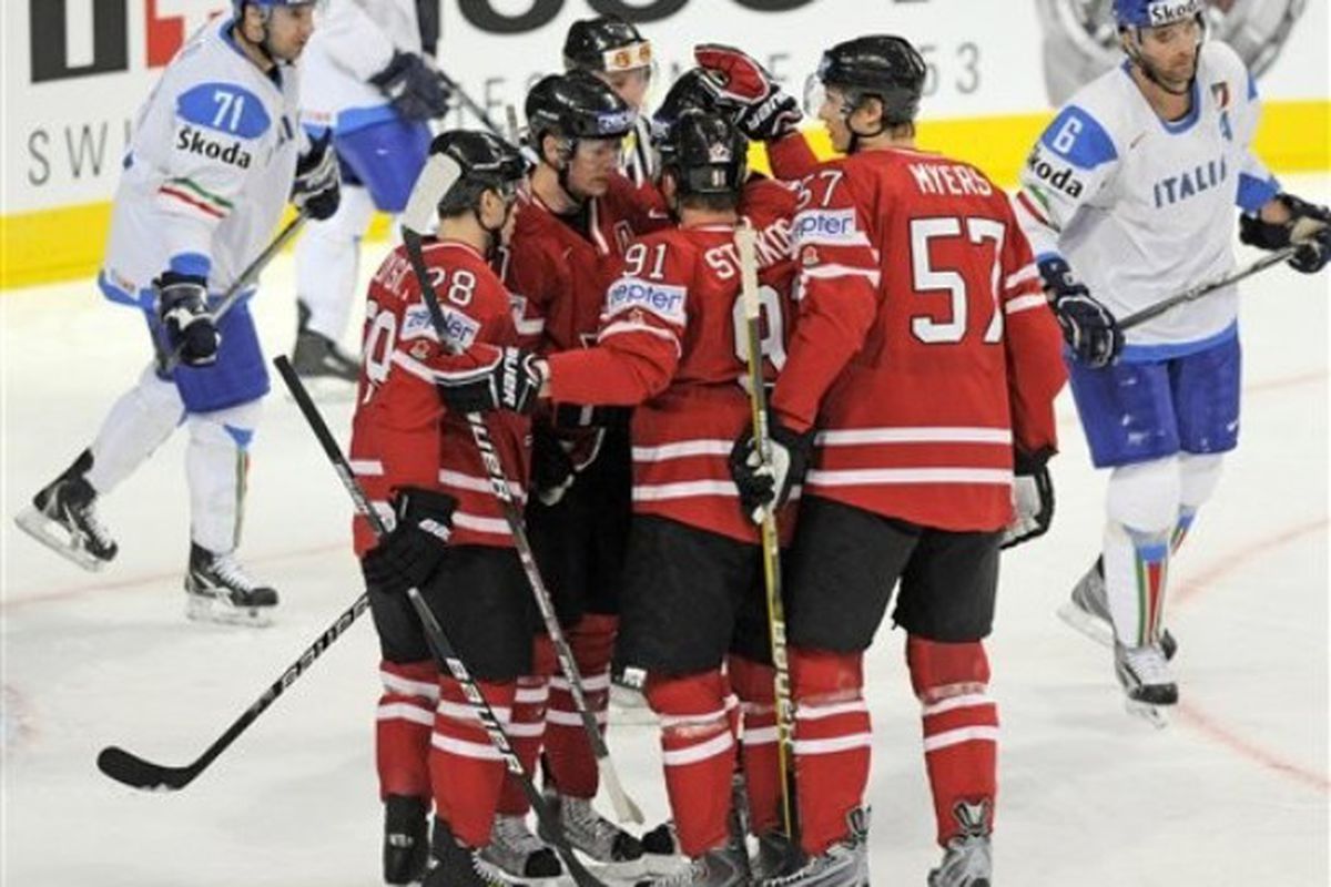 AP Photo - The Canadian team celebrates after scoring l during the group B match between Canada and Italy at the Ice Hockey World Championships in Mannheim, Germany, on Saturday, May 8, 2010.