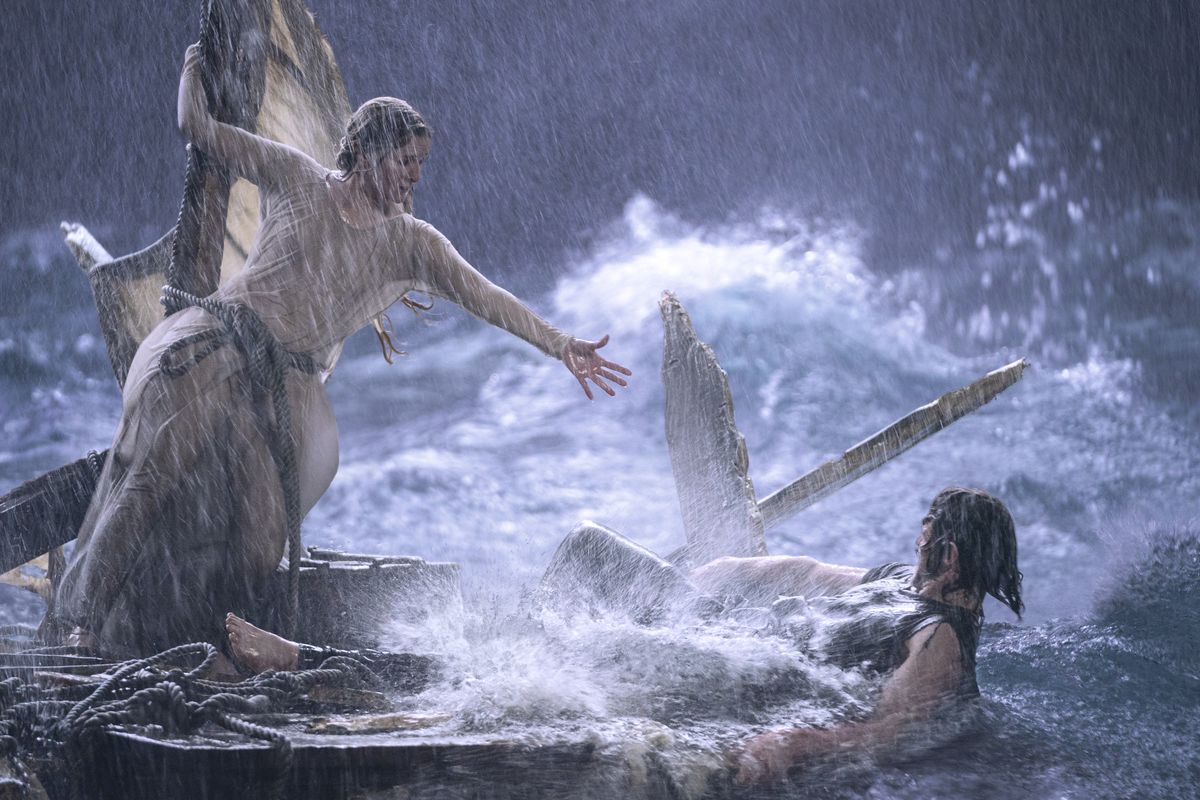 Galadriel, adrift on flotsam in a terrible storm, reaches out to Halbrand as they try to survive on the open sea.