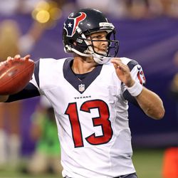 Aug 9, 2013; Minneapolis, MN, USA; Houston Texans quarterback T.J. Yates (13) gets ready to throw a pass in the second quarter against the Minnesota Vikings at the Metrodome. 