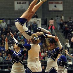 Cheerleaders perform during the halftime show as the Piute Thunderbirds play the Panguitch Bobcats in the girls 1A basketball championship at the Sevier Valley Center in Richfield Saturday, Feb. 21, 2015. The Bobcats beat the Thunderbirds, 58-28.