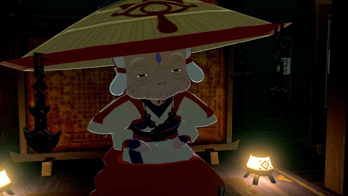 Impa, an old woman Sheikah, peers up from under her large straw hat in Breath of the Wild