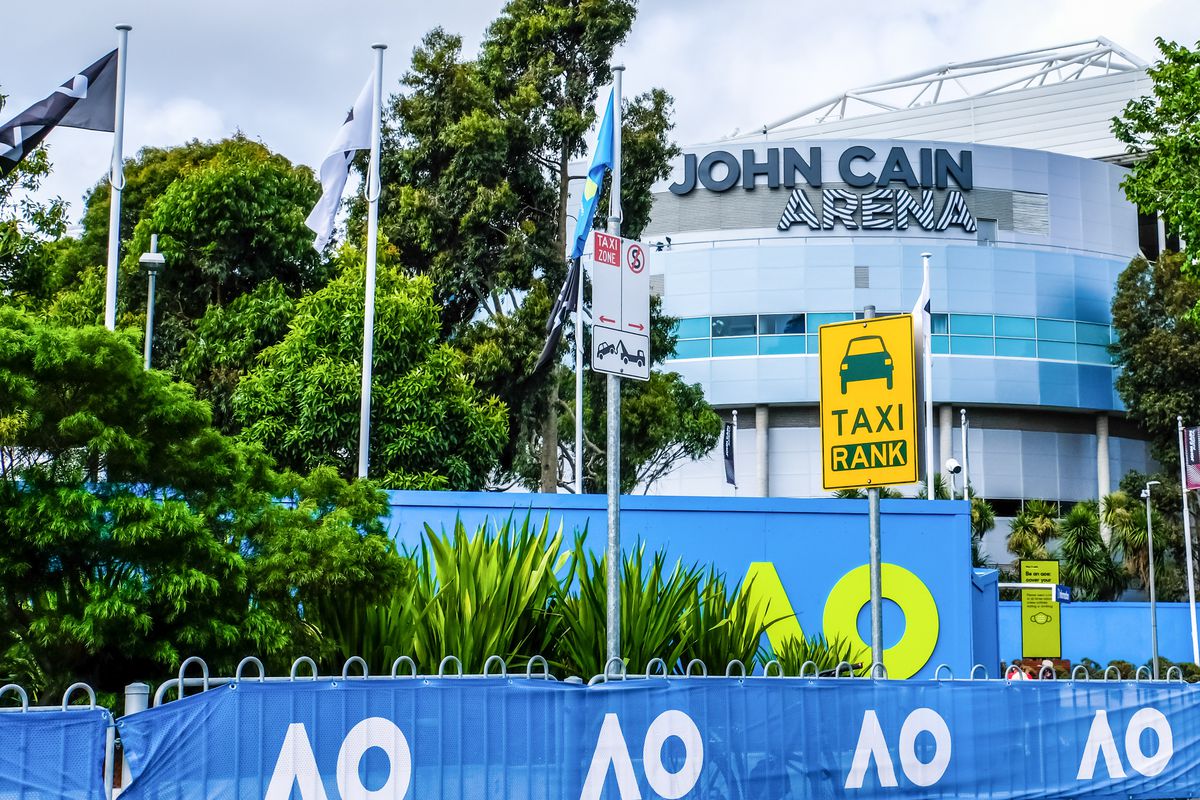 An empty taxi rank at the Australian Open Grand Slam tennis tournament with newly renamed John Cain Arena (formerly known as Melbourne Arena and Hisense Arena and Vodafone Arena) in Melbourne’s Olympic Park.