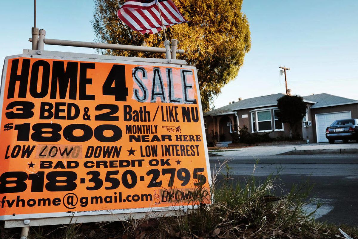 This Saturday, Jan. 17, 2015 photo shows a sign advertising a house for sale in Los Angeles.  Standard & Poor’s releases its 20-city home price index for December and the fourth quarter on Tuesday, Feb. 24, 2015. 