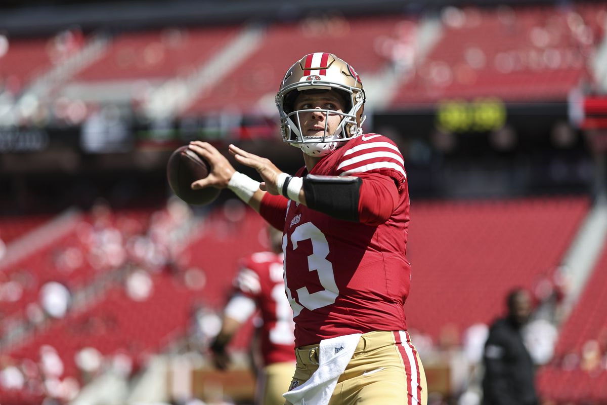 Brock Purdy #13 of the San Francisco 49ers passes as he warms up prior to an NFL football game between the San Francisco 49ers and the Arizona Cardinals at Levi’s Stadium on October 01, 2023 in Santa Clara, California.