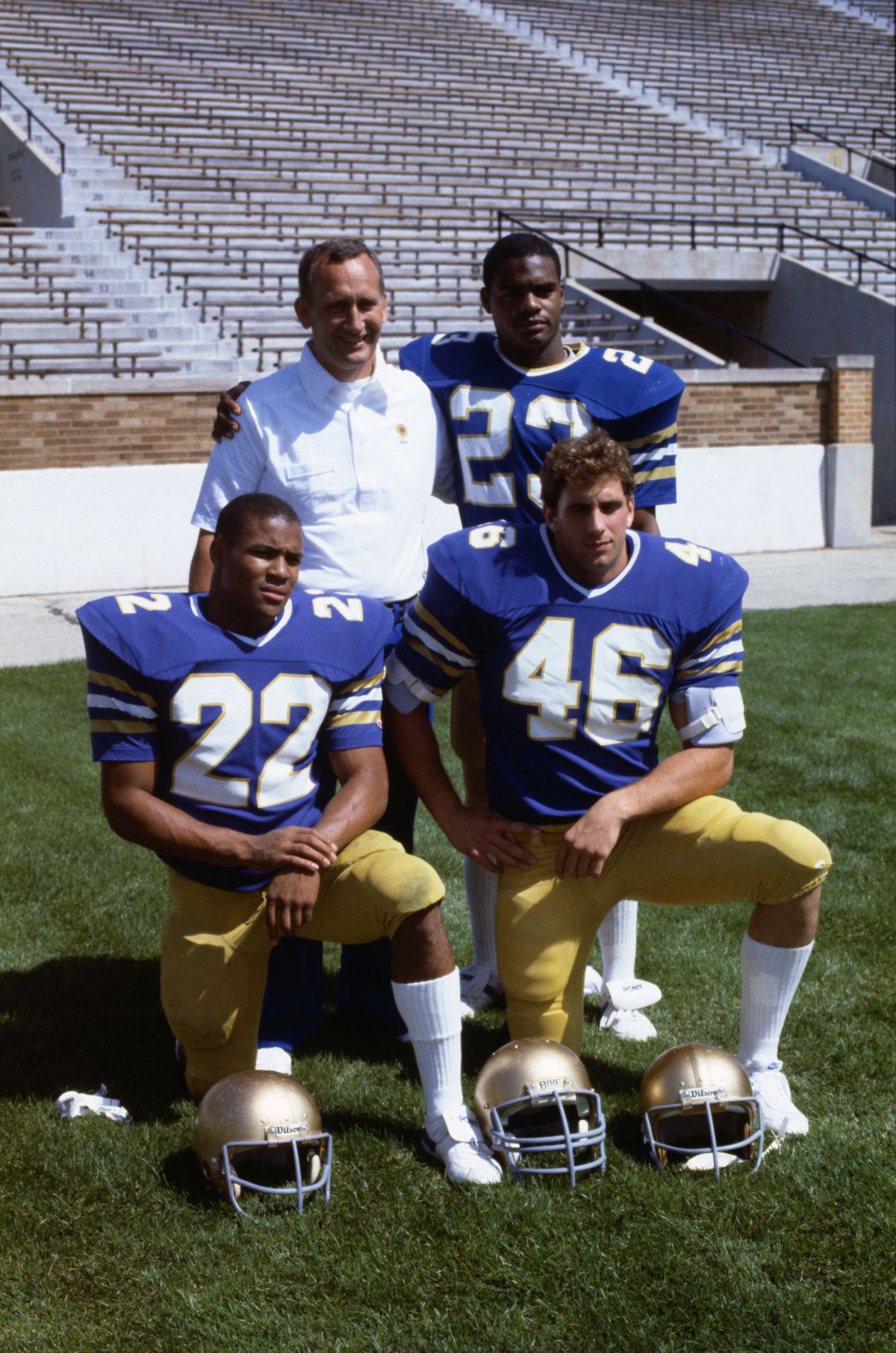 Head Coach and Tri-Captains of Notre Dame Football Team