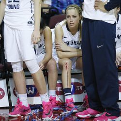 Brigham Young Cougars guard Makenzi Morrison Pulsipher (23) sits on the bench after losing to the San Francisco Lady Dons during the West Coast Conference Tournament Championship in Las Vegas Tuesday, March 8, 2016. San Francisco won 70-68.