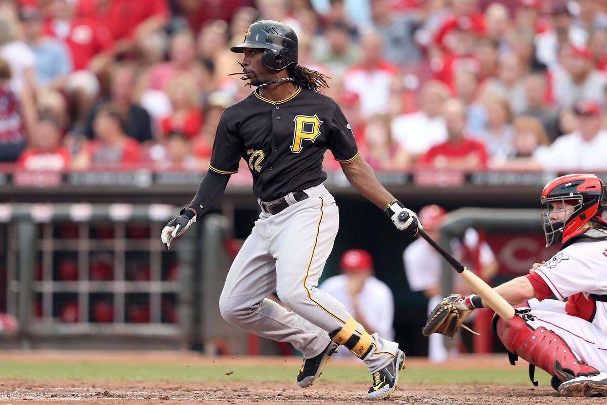 CINCINNATI, OH - AUGUST 03:  Andrew McCutchen #22 of the Pittsburgh Pirates hits a single during the game against the Cincinnati Reds at Great American Ball Park on August 3, 2012 in Cincinnati, Ohio.  (Photo by Andy Lyons/Getty Images)