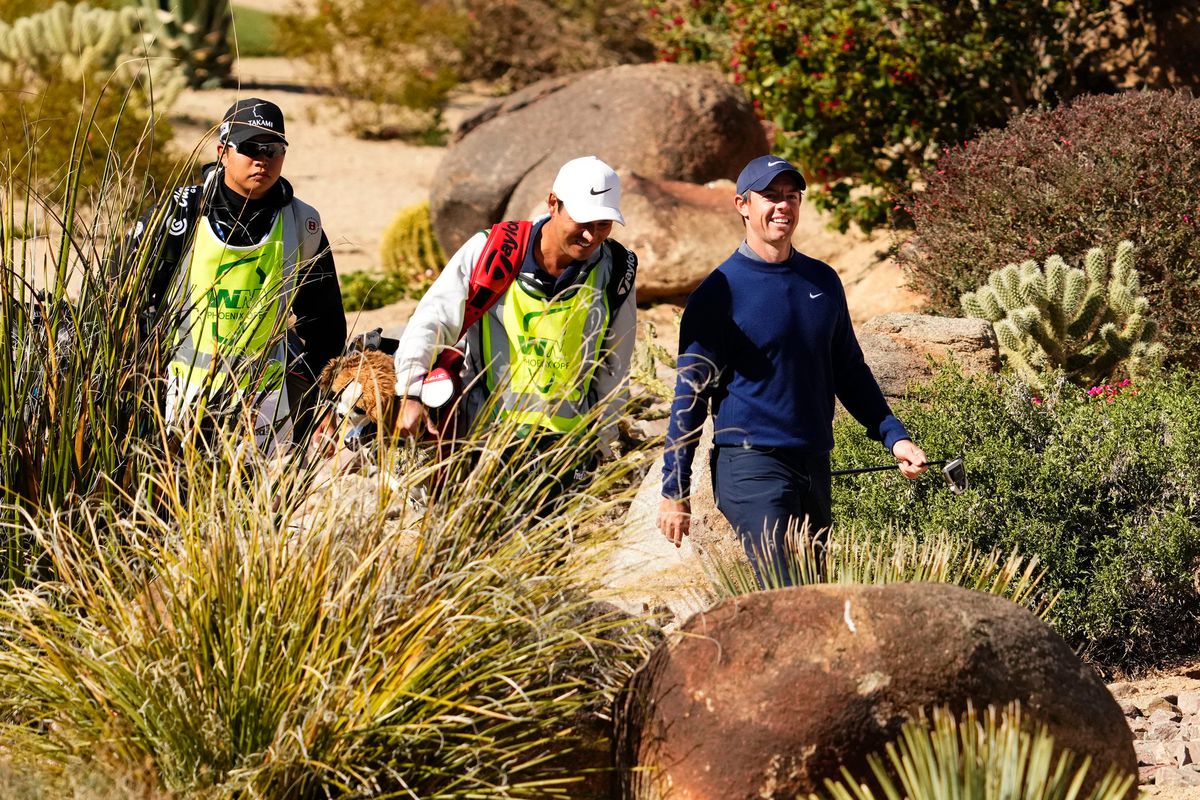 Rory McIlroy walks through the desert area on the 16th hole during round one of the WM Phoenix Open at TPC Scottsdale.