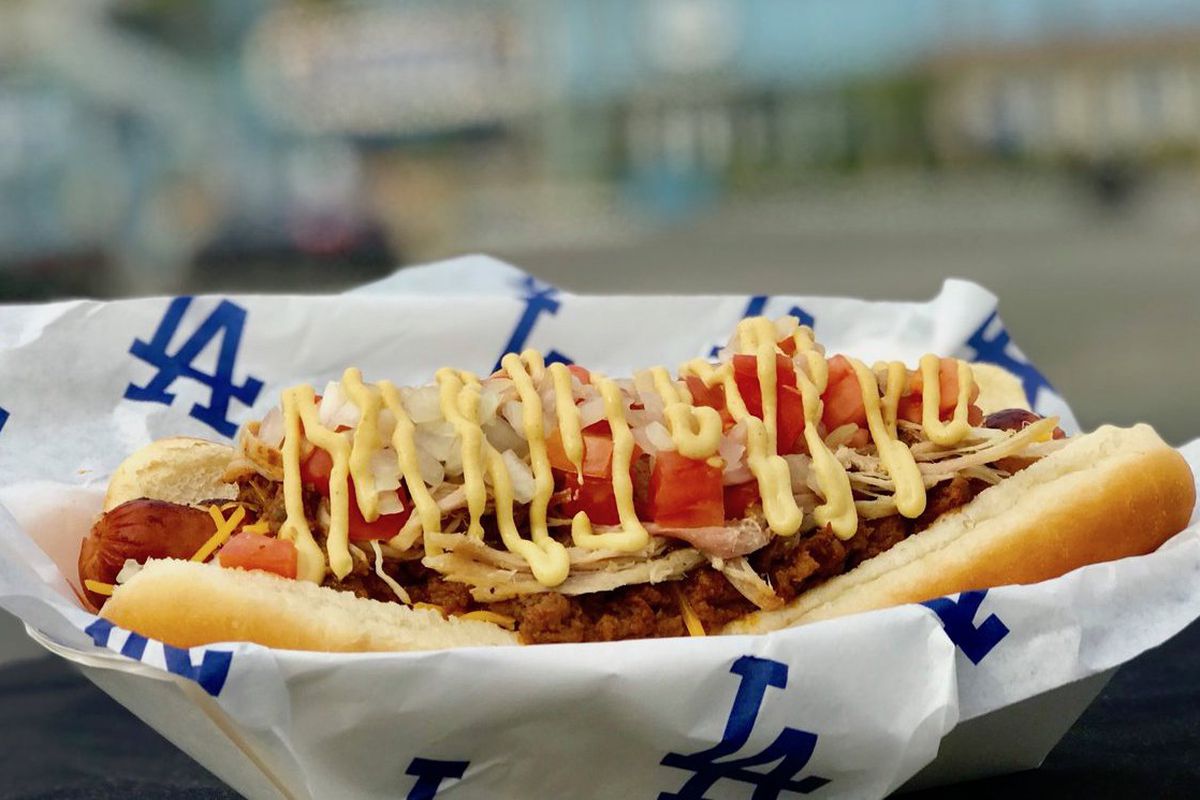 Dodger Dog covered with toppings at Dodger Stadium.