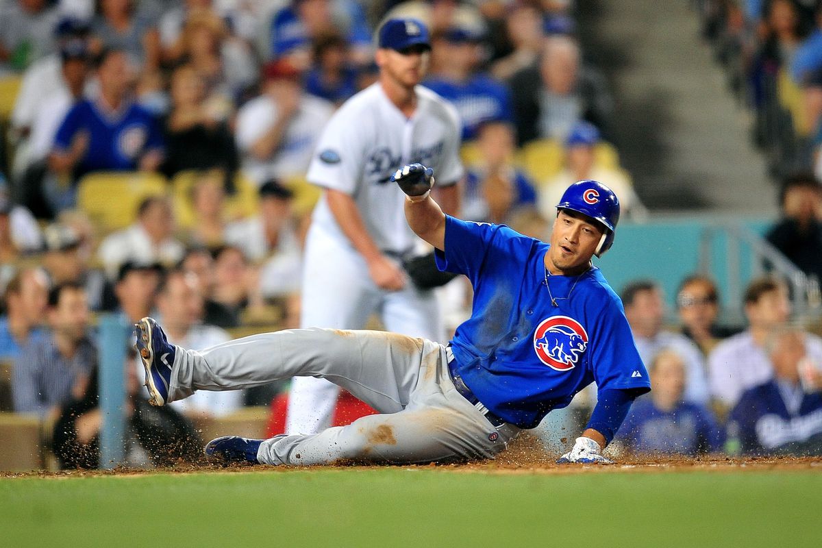 Los Angeles, CA, USA; Chicago Cubs second baseman Darwin Barney scores a run against the Los Angeles Dodgers at Dodger Stadium. Credit: Gary A. Vasquez-US PRESSWIRE