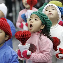 South Korean kindergarteners sing Christmas carols during a charity concert in Seoul, South Korea, on Nov. 4, 2008. Christmas is one of the biggest holidays in South Korea where over half of the population is Christian.