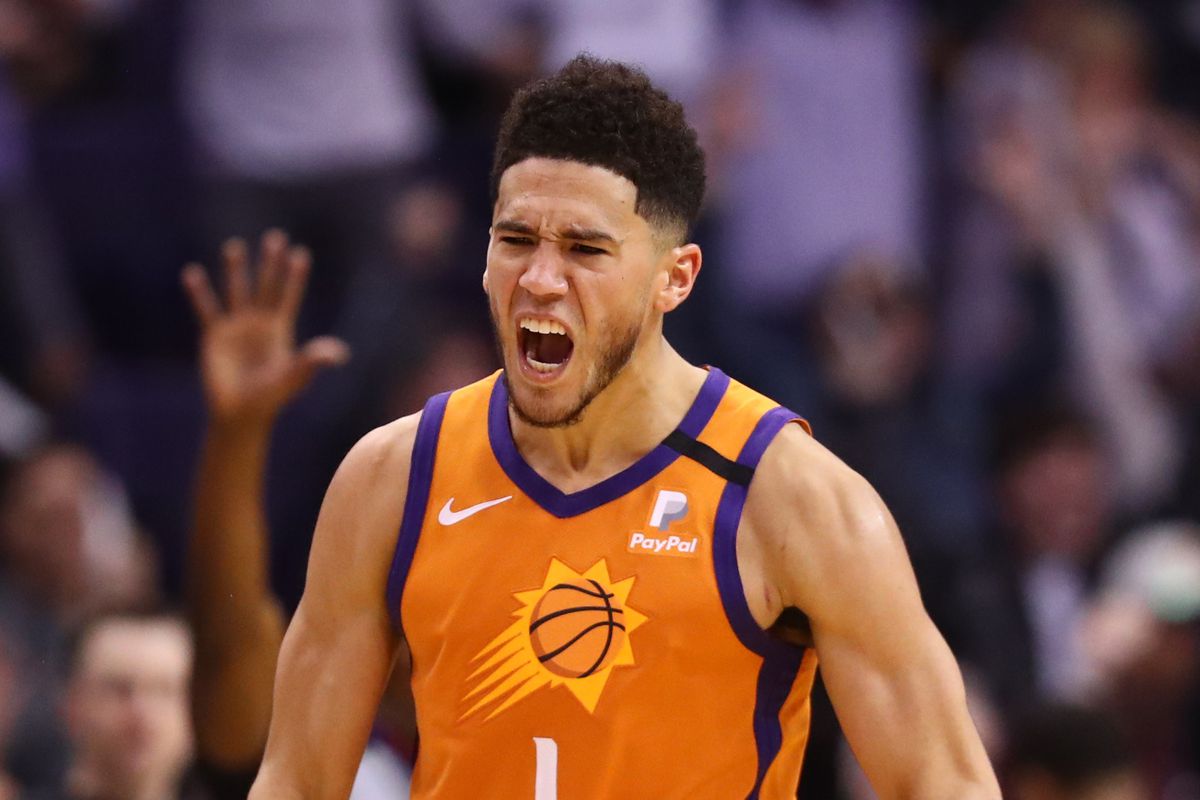 Phoenix Suns guard Devin Booker celebrates a three pointer against the Orlando Magic in the second half at Talking Stick Resort Arena.&nbsp;