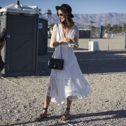 Flowy white dresses and strappy sandals are great desert attire.