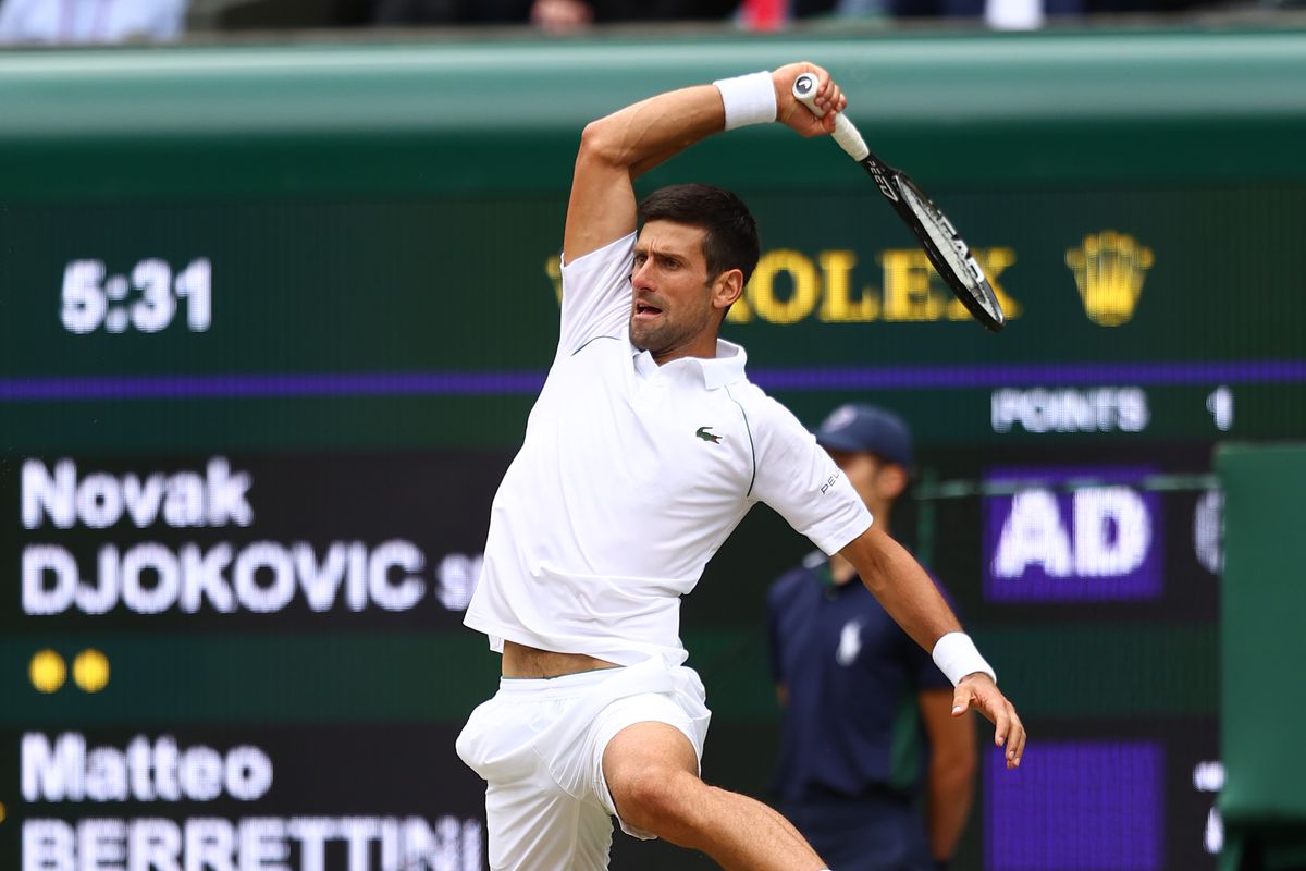 Novak Djokovic of Serbia plays a forehand during his men’s Singles Final match against Matteo Berrettini of Italy on Day Thirteen of The Championships - Wimbledon 2021 at All England Lawn Tennis and Croquet Club on July 11, 2021 in London, England.