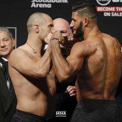 Chad Laprise and Dhiego Lima square off at UFC 231 weigh-ins.