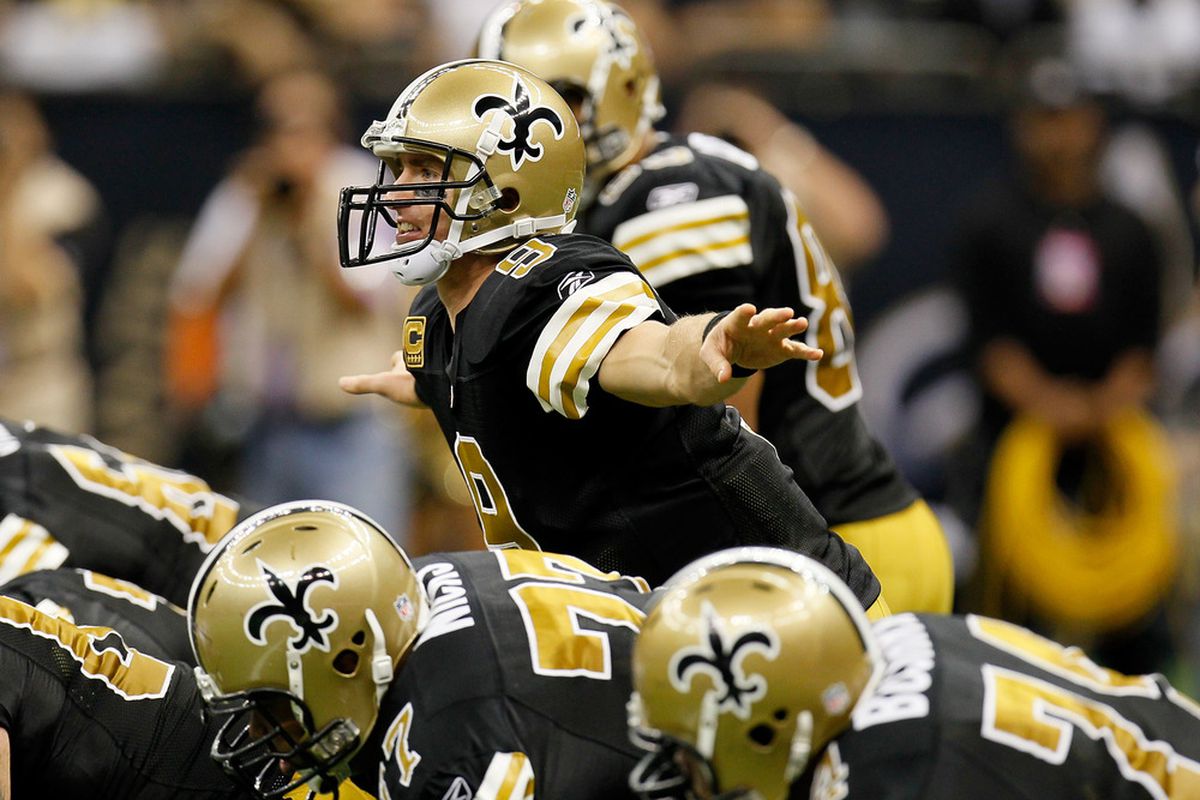 NEW ORLEANS, LA - NOVEMBER 06:  Drew Brees #9 of the New Orleans Saints yells to his offense against the Tampa Bay Buccaneers at Mercedes-Benz Superdome on November 6, 2011 in New Orleans, Louisiana.  (Photo by Kevin C. Cox/Getty Images)