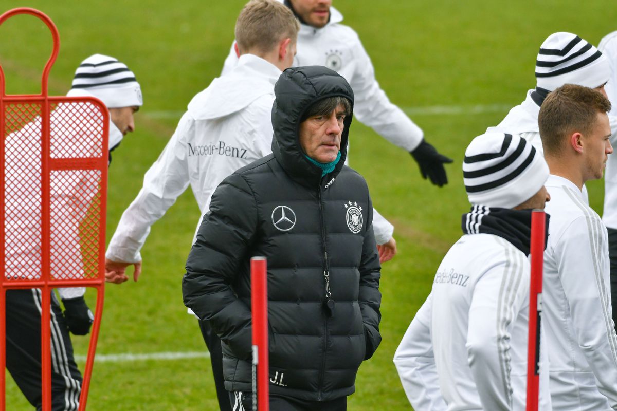 Head coach of the German national football team Joachim Löw (C) attends a training session ahead of their international friendly match against Spain at Paul-Janes-Stadion on March 21, 2018 in Düsseldorf, western Germany. The international friendly match in preparation of the Football World Cup is taking place on March 23, 2018 in Duesseldorf.