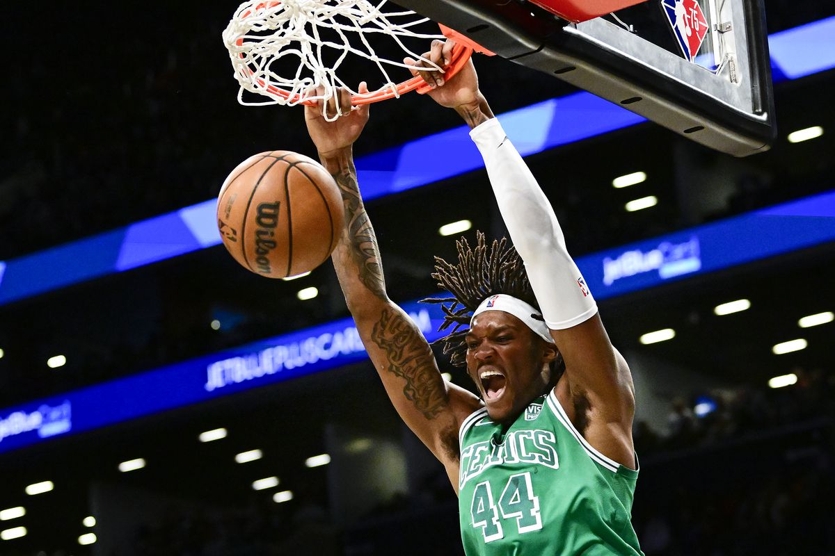 Robert Williams III #44 of the Boston Celtics dunks the ball against the Brooklyn Nets in the first half at Barclays Center on February 08, 2022 in New York City