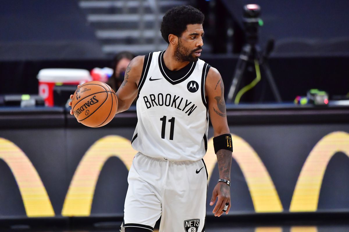 Kyrie Irving of the Brooklyn Nets dribbles in the first half against the Toronto Raptors at Amalie Arena on April 27, 2021 in Tampa, Florida.&nbsp;