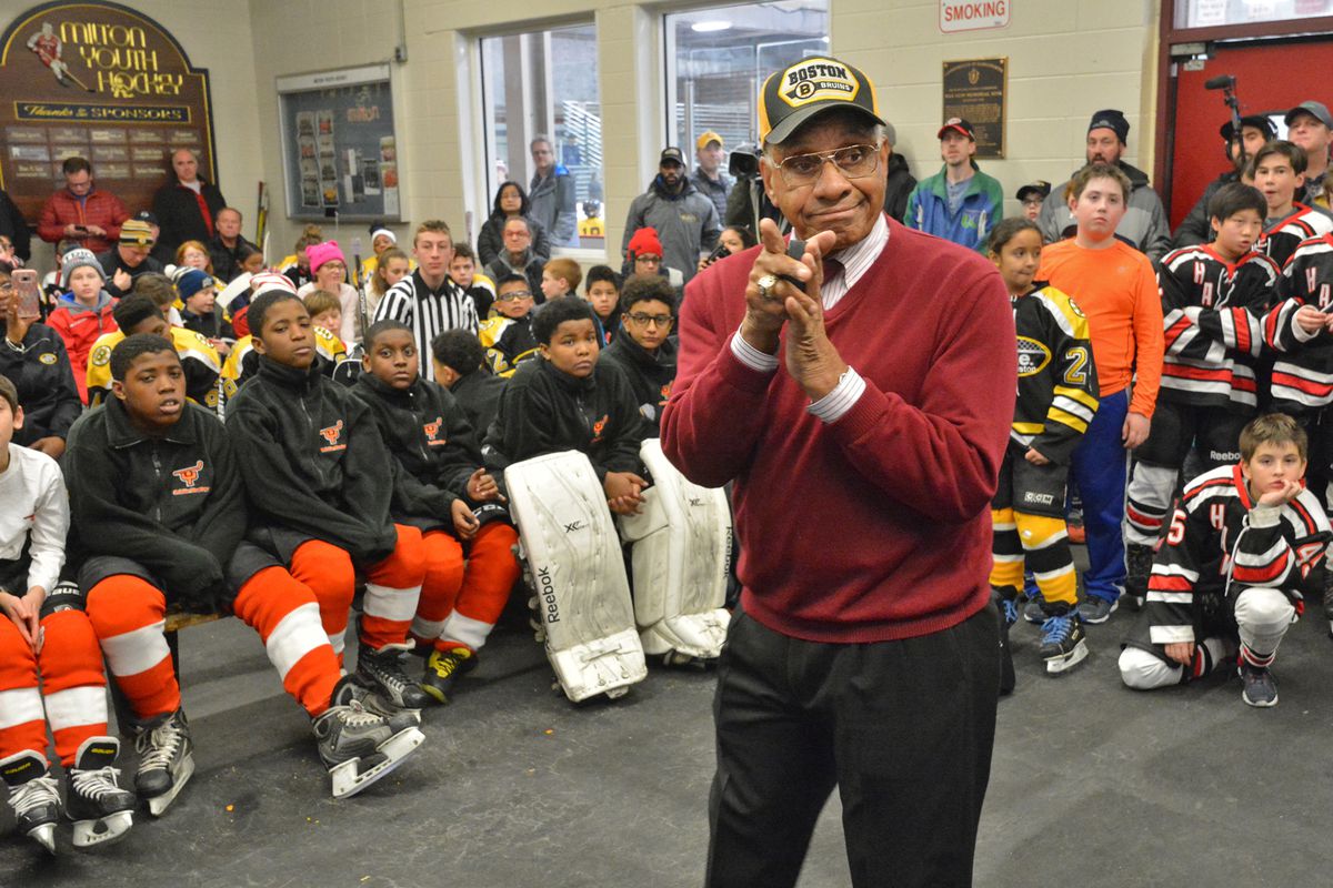 Willie O’Ree, the first black player in the NHL, talks to kids playing in a diversity tourney at the Ulin Rink. O’Ree 82, is in town to be honored by the NHL and the Bruins, who are celebrating the 60th anniversary of him entering the league. January 13, 2018