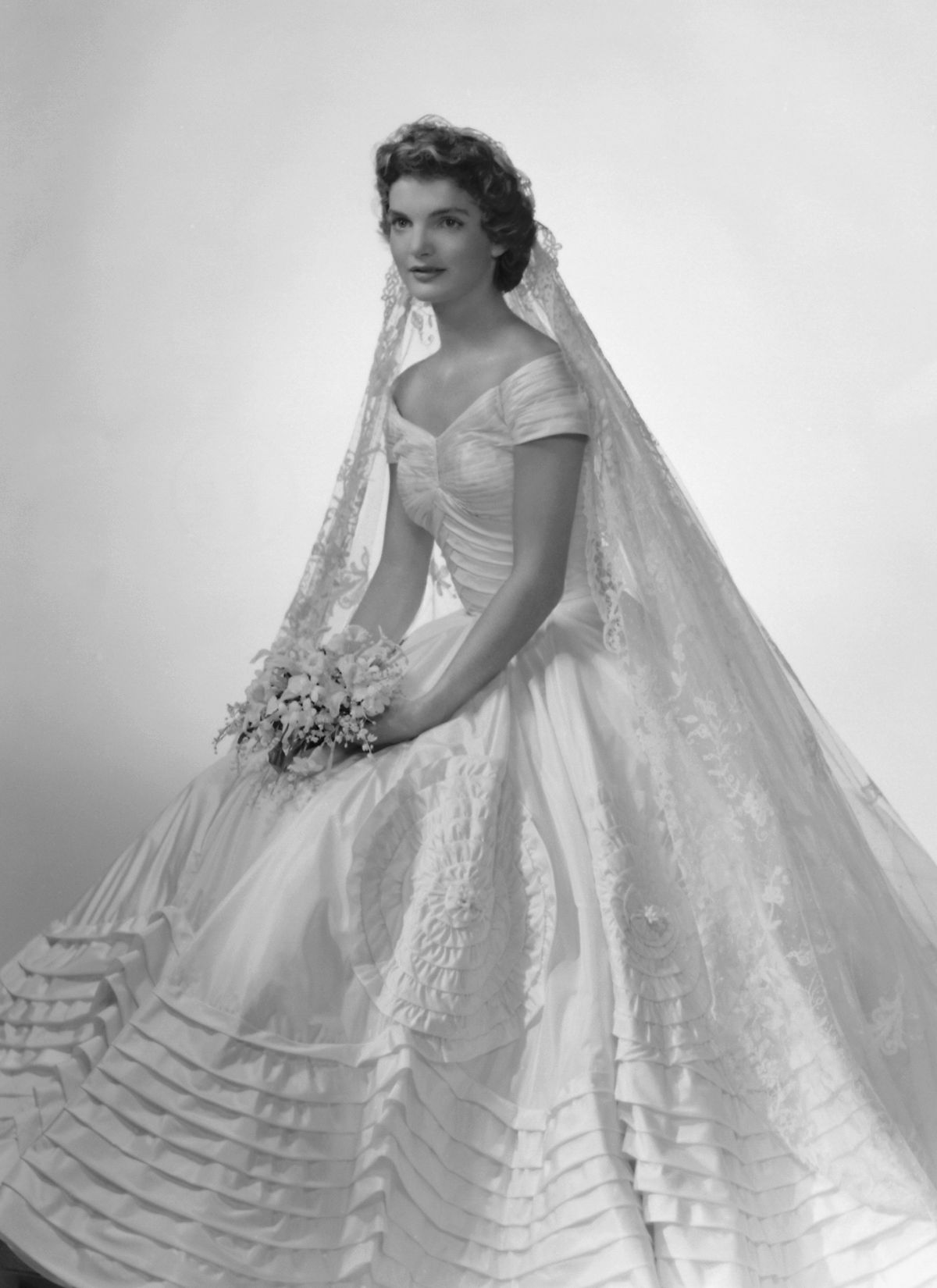 Jackie Kennedy in her wedding dress, designed by Ann Lowe.