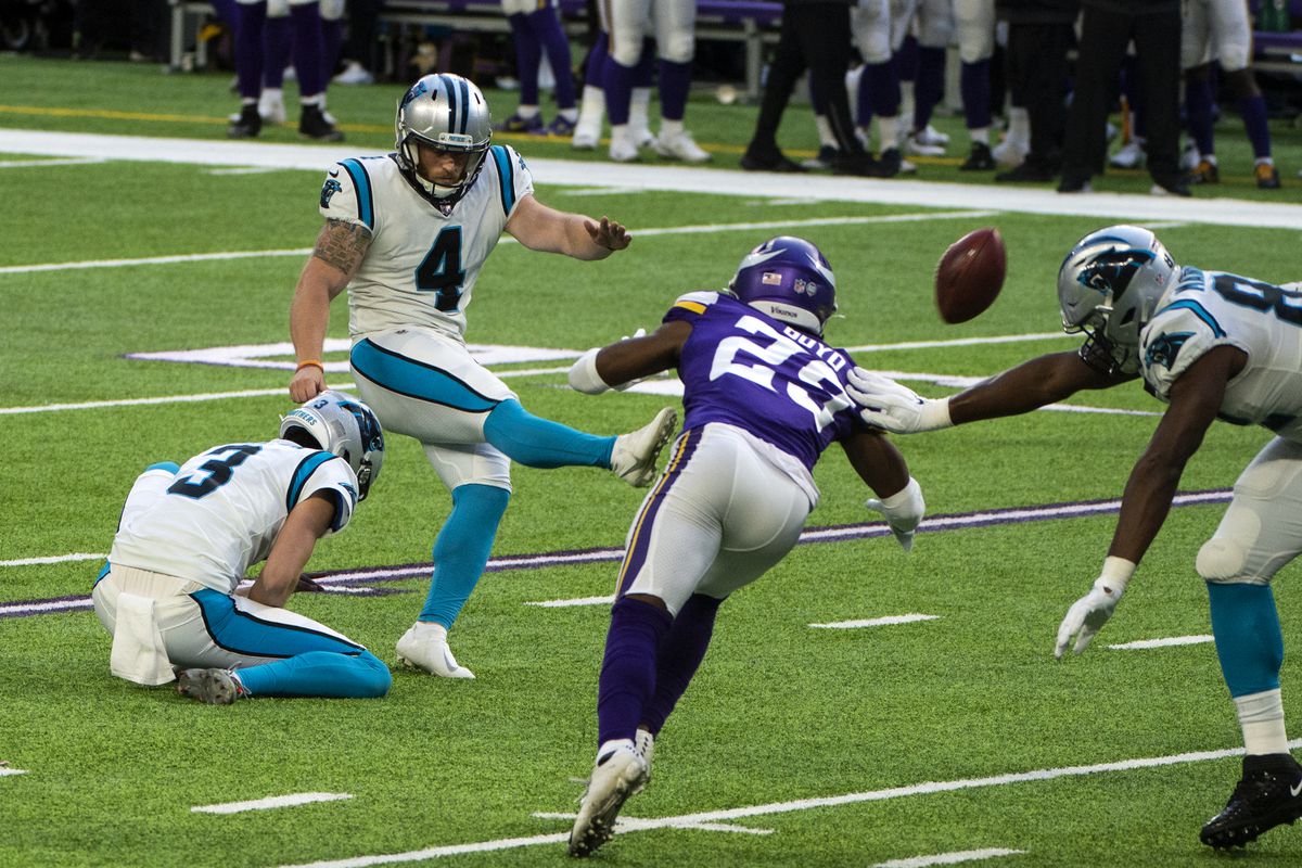 Joey Slye #4 of the Carolina Panthers kicks an extra point in the second quarter of the game against the Minnesota Vikings at U.S. Bank Stadium on November 29, 2020 in Minneapolis, Minnesota.