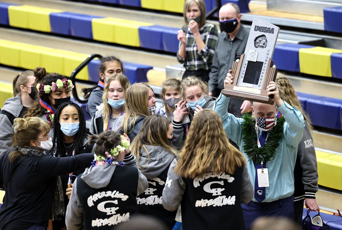 Copper Hills girls celebrate their second place finish in 6A State Wrestling championship at West Lake High in Saratoga Springs on Monday, Feb. 15, 2021.