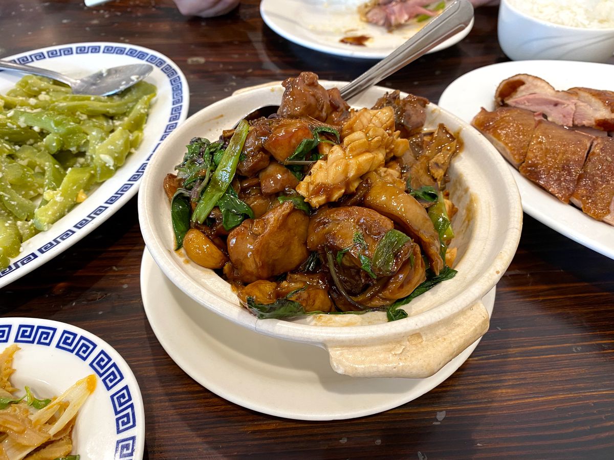 Three cup chicken, intestines, and seafood at Tasty House in San Gabriel.