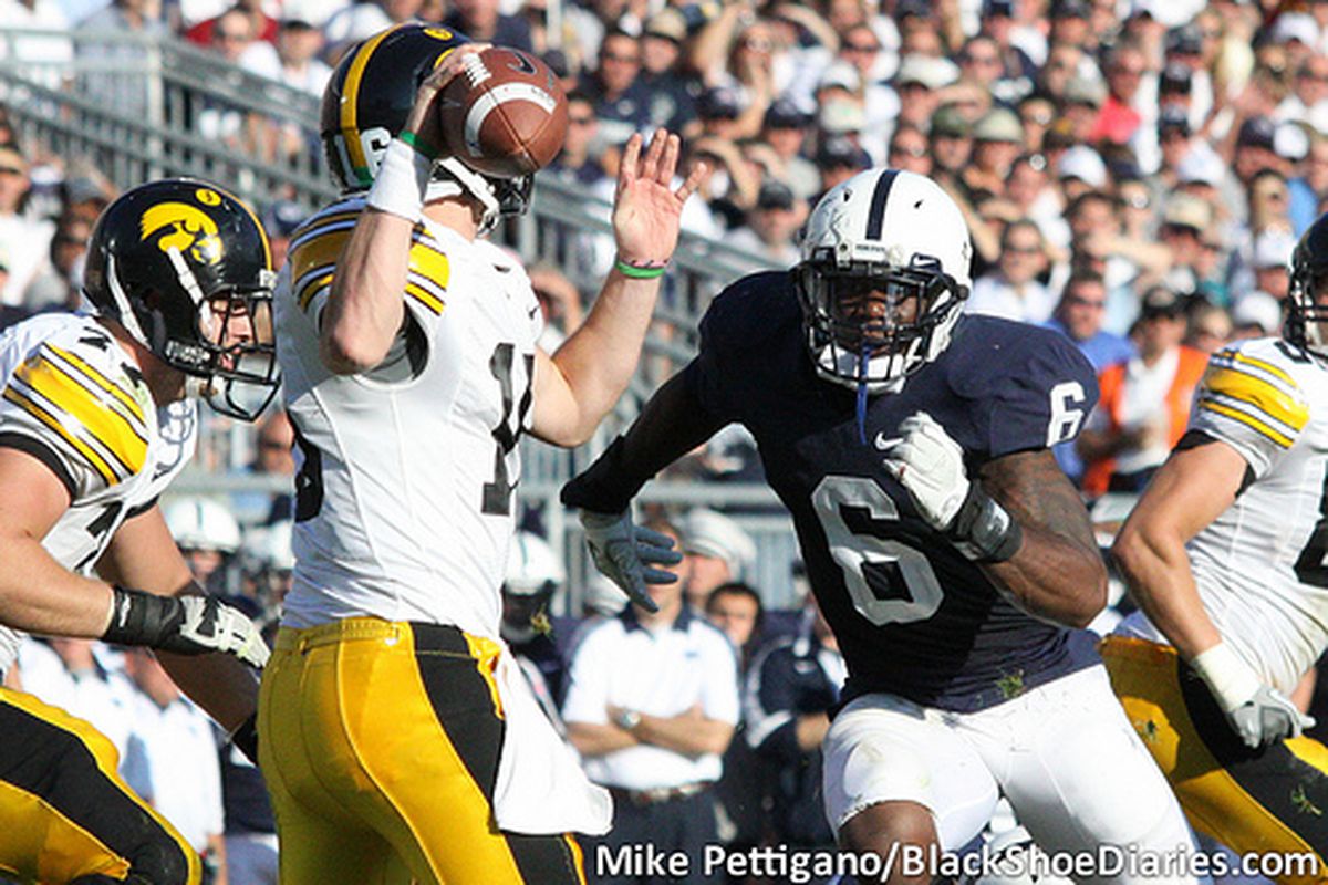 Gerald Hodges (6) in the face of James Vandenberg (16) during Penn State's win over Iowa, 13-3, Oct. 8, 2011. 