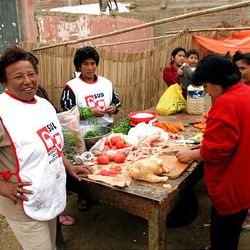 Relief Society members in Grocio Prado, Peru, prepare a communal soup with meat and vegetables provided by the LDS Church. Many of these women lost their own homes in the magnitude 8 quake.