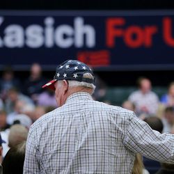 A couple look for open seats in the Grande Ballroom as they get ready for Ohio Gov. John Kasich to hold a Town Hall meeting at UVU Friday, March 18, 2016.