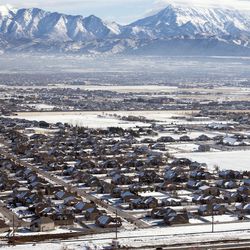 Housing developments clutter the landscape of Herriman on Tuesday, Dec. 20, 2016. The U.S. Census reports Utah is now the fastest-growing state in the Union.