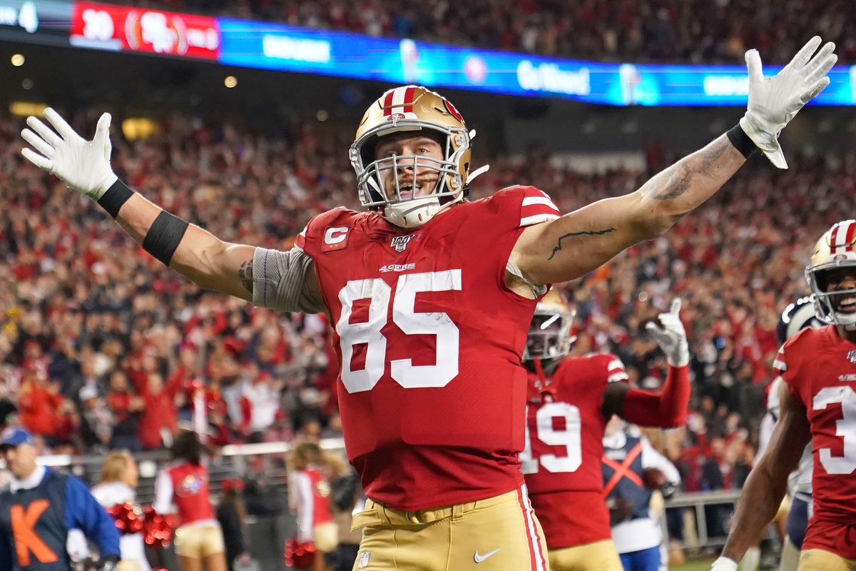 George Kittle #85 of the San Francisco 49ers celebrates after catching a touchdown pass against the Los Angeles Rams during the second half of an NFL football game at Levi’s Stadium on December 21, 2019 in Santa Clara, California.