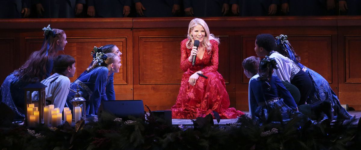 Kelli O’Hara performs with the Tabernacle Choir at Temple Square and Orchestra at Temple Square during a Christmas concert at the Conference Center in Salt Lake City on Thursday, Dec. 12, 2019.