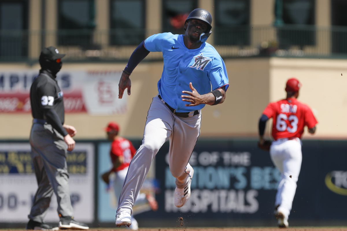 Miami Marlins right fielder Jorge Soler (12) runs past second base in the fourth inning against the St. Louis Cardinals during spring training at Roger Dean Stadium