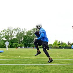 Detroit Lions running back Reggie Bush (21) during organized team activities at Lions training facility.