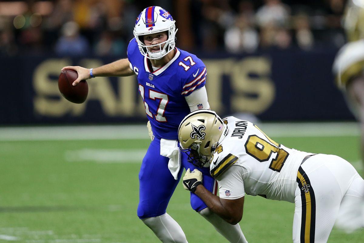 Buffalo Bills quarterback Josh Allen (17) is almost sacked by New Orleans Saints defensive end Cameron Jordan (94) in the second quarter at the Caesars Superdome.