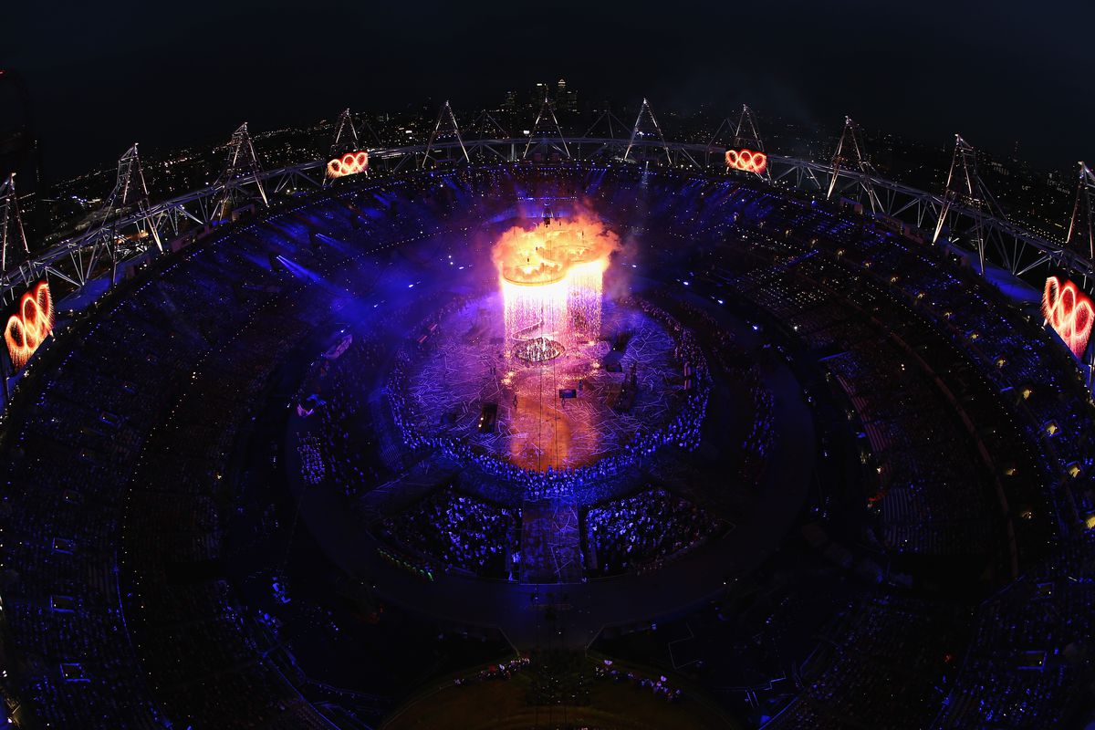 LONDON, ENGLAND - JULY 27:  The Olympic Rings form during the Opening Ceremony of the London 2012 Olympic Games at the Olympic Stadium on July 27, 2012 in London, England.  (Photo by Chris McGrath/Getty Images)
