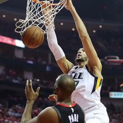 Utah Jazz center Rudy Gobert (27) dunks over Houston Rockets guard Chris Paul (3) as the Utah Jazz and the Houston Rockets play game two of the NBA playoffs at the Toyota Center in Houston on Wednesday, May 2, 2018.